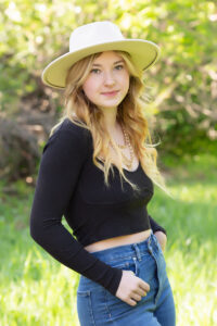 Littleton Senior Picture of a girl in tall wild grass