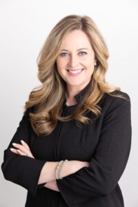 Denver based female attorney poses for a high end corporate headshot