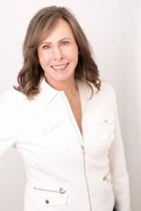 headshot of a woman over 60