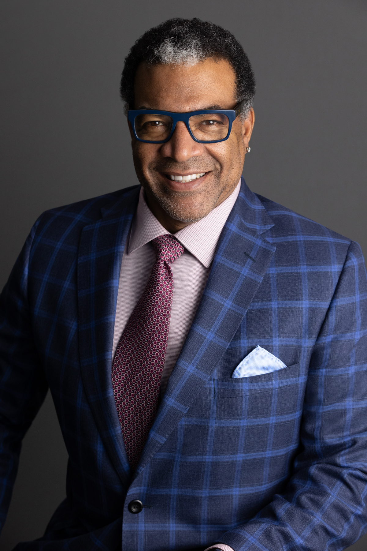 Corporate Headshot of a man in a suit in our Littleton Photo Studio near Greenwood Village